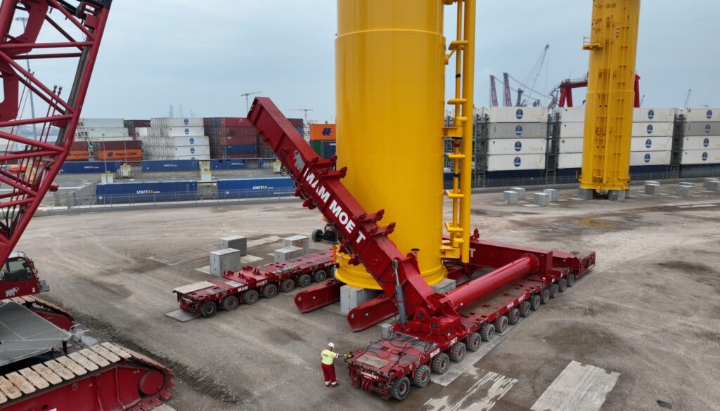 Mammoet transforms self-propelled modular transporter trailers into giant forklifts for an offshore wind marshalling solution of offshore wind turbine transition pieces at BOW terminal in the Netherlands for the Iles d'Yeu and Noirmoutier offshore wind project in France.