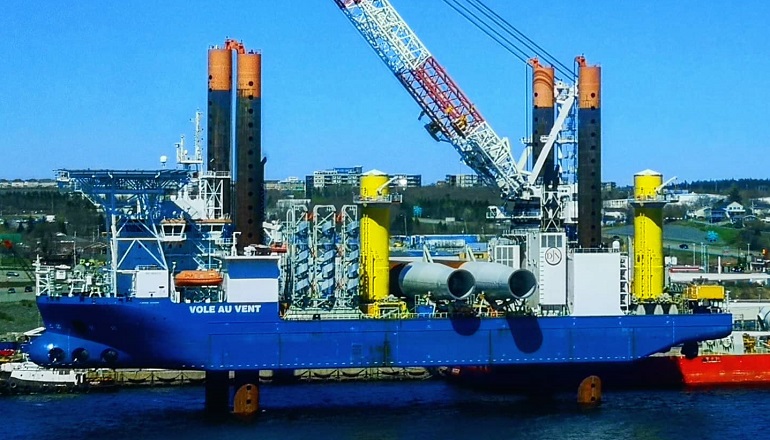 Jan De Nul's offshore wind turbine installation vessel Vole au Vent loads components in Halifax