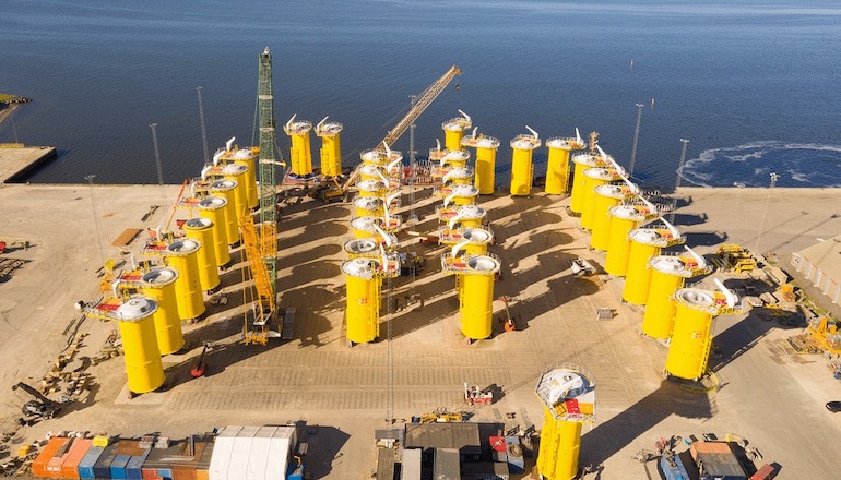 Transition pieces lined up at Bladt's yard in Denmark ready for Vattenfall's Kriegers Flak offshore wind farm off the Danish coast