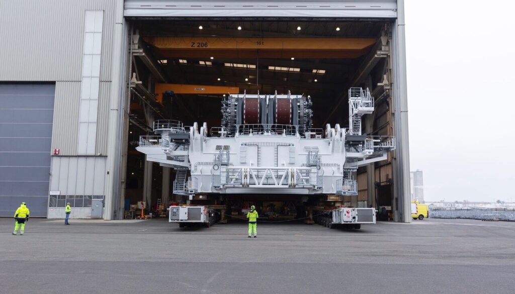 Part of the crane that will feature on OHT's new Alfa Lift installation vessel starts its journey to the northern part Liebherr's Rostock plant