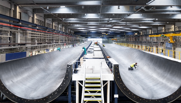 Vestas lifts 2026 guidance on record revenue Vestas pauses Polish turbine factory investment