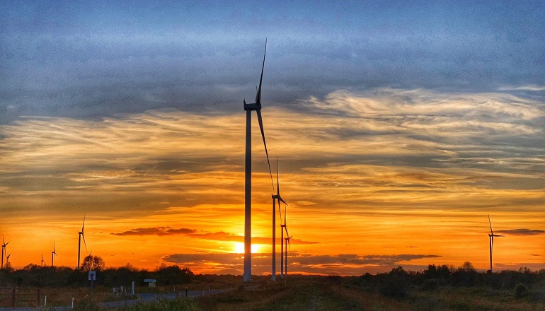 Mountlucas wind farm in Ireland bathed in sunlight