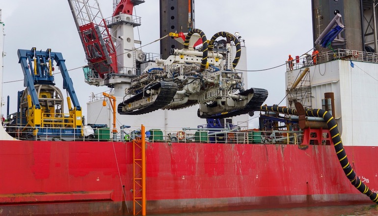 Van Oord's Deep Dig-It underwater excavator deployed for TenneT to lay cables for offshore wind farms off the Netherlands